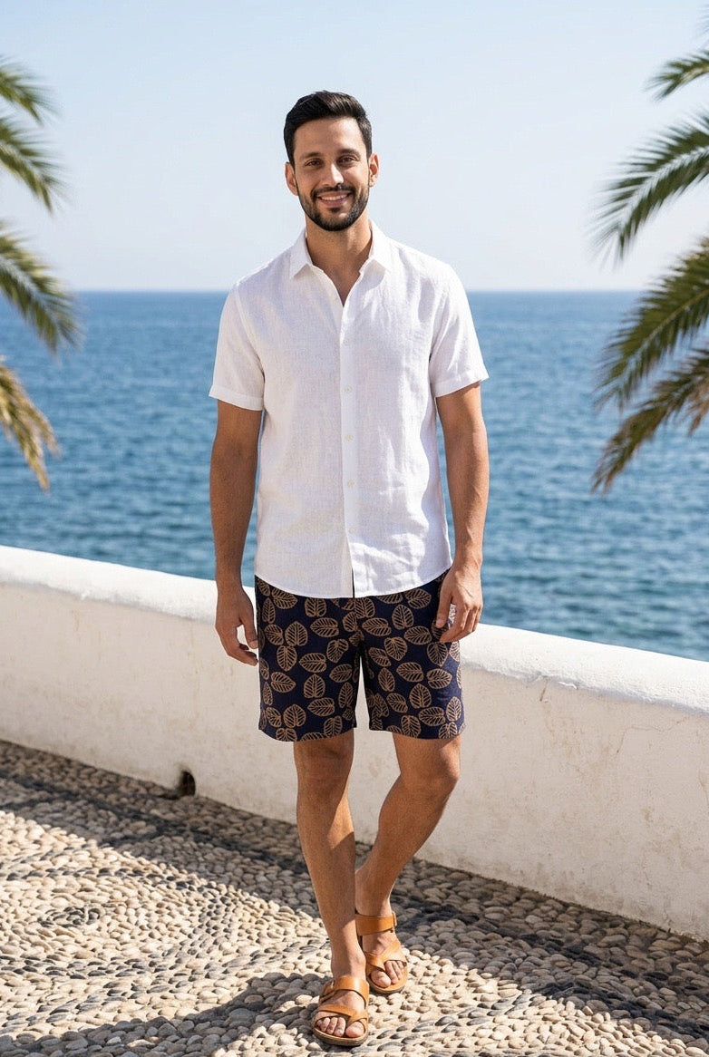 navy shorts feature a prominent beige leaf print and a drawstring waist (XL)
